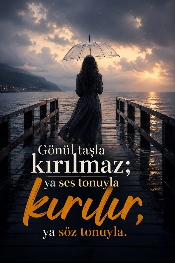 Şemsiyeyle iskelede duran kişi ve gönlün taşla değil, ses tonu ve söz tonuyla kırıldığını anlatan anlamlı söz.