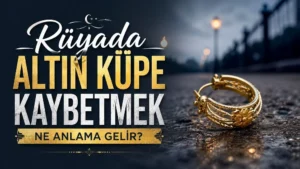 Rüyada altın küpe kaybetmek ne anlama gelir başlıklı kapak görselinde, karanlık ve ıslak bir zeminde duran altın küpe ile büyük tipografik başlık yer alıyor.